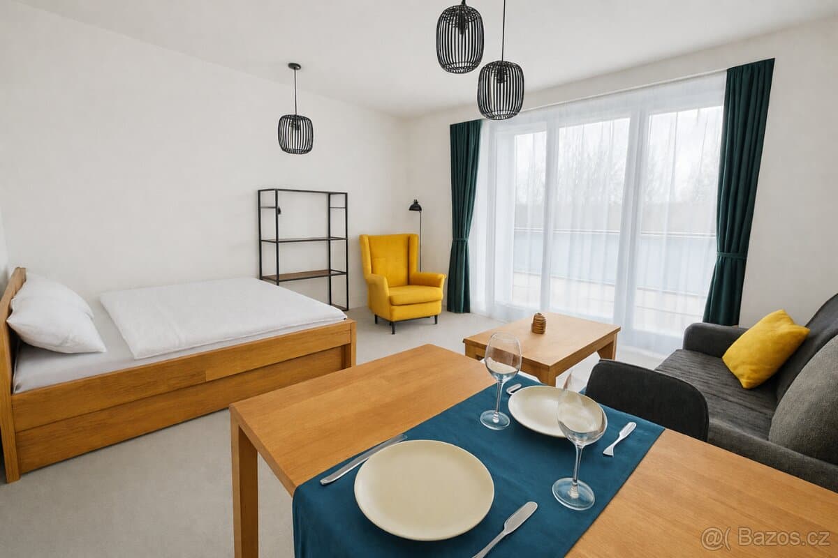 Prodej moderního vybaveného apartmánu 1+kk s terasou v srdci